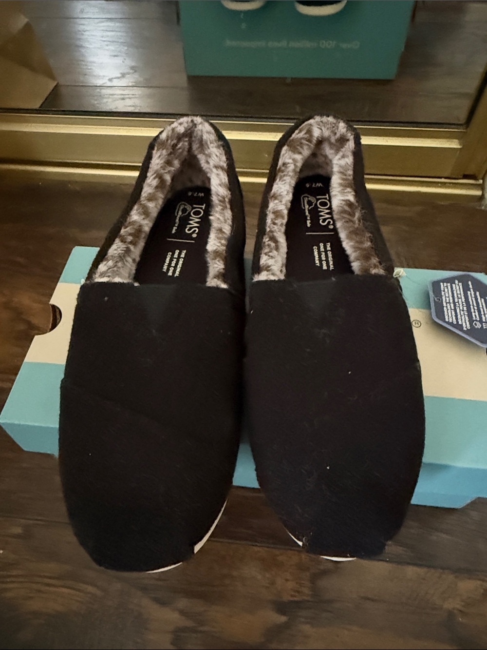TOMS Black Slip-On Loafers with Faux-Fur Lining
